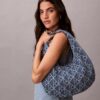 Allover Emblem Logo Denim Hobo Bag Allover Emblem Logo Denim Hobo Bag