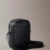 Allover Embossed Emblem Logo Slim Reporter Bag