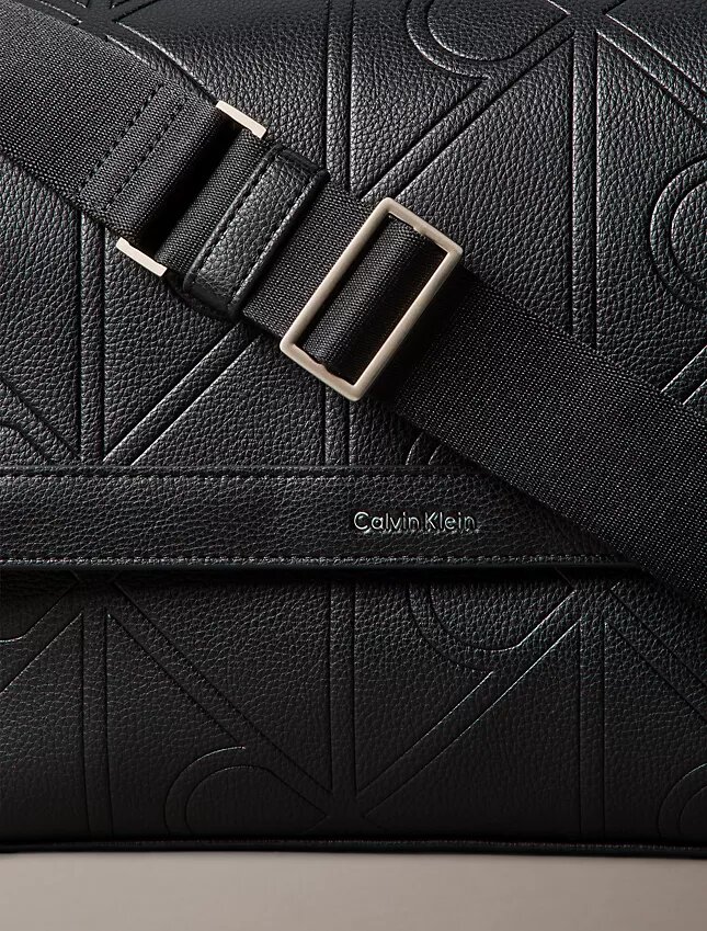 Allover Embossed Emblem Messenger Bag Allover Embossed Emblem Messenger Bag