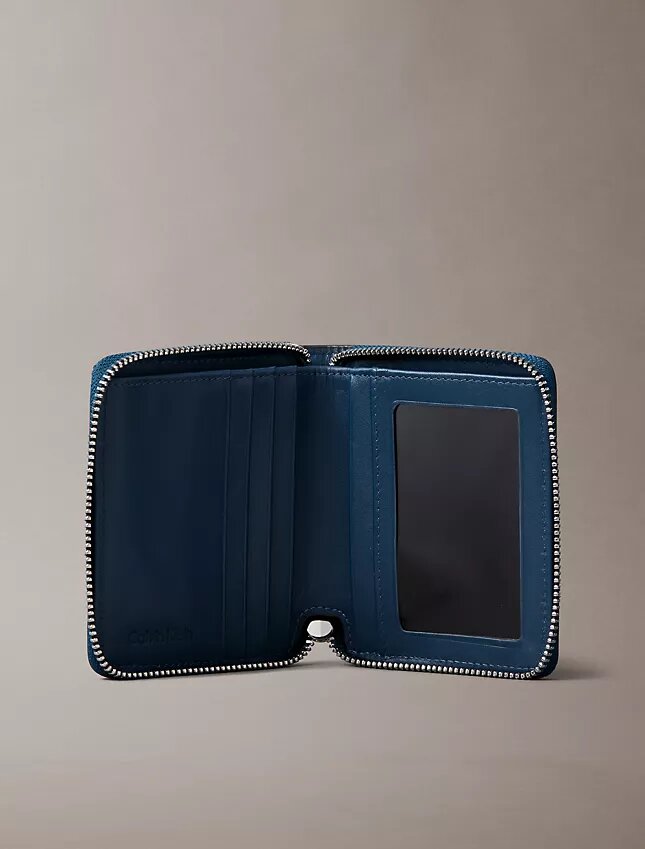 Embossed Allover Emblem Logo Zip Wallet Embossed Allover Emblem Logo Zip Wallet