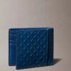 Embossed Allover Monogram Bifold Wallet with Coin Pouch Embossed Allover Monogram Bifold Wallet with Coin Pouch