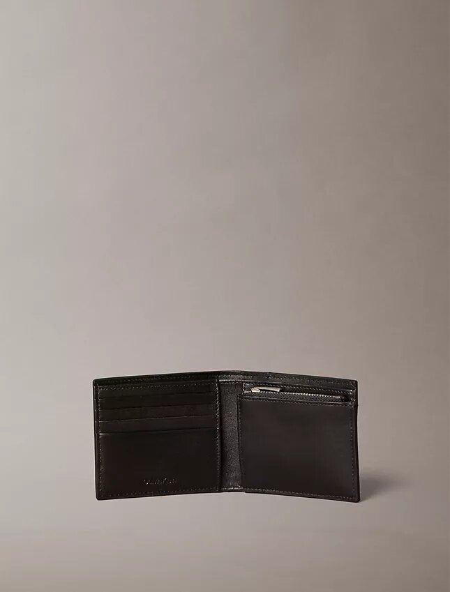 Embossed Allover Monogram Bifold Wallet with Coin Pouch Embossed Allover Monogram Bifold Wallet with Coin Pouch
