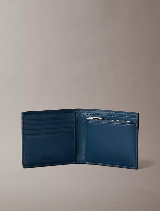 Embossed Allover Monogram Bifold Wallet with Coin Pouch Embossed Allover Monogram Bifold Wallet with Coin Pouch