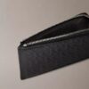 Embossed Allover Monogram Zip Wallet