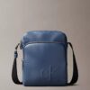 Embossed Monogram Zip Pocket Reporter Bag Embossed Monogram Zip Pocket Reporter Bag