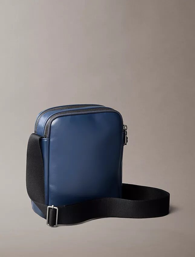 Embossed Monogram Zip Pocket Reporter Bag Embossed Monogram Zip Pocket Reporter Bag