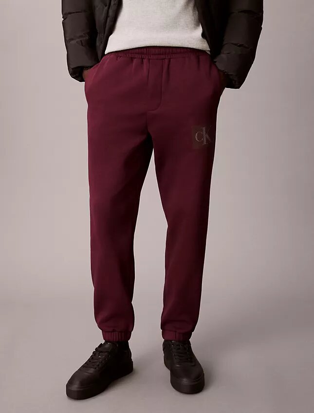 Fleece Layered Monogram Graphic Sweatpants Fleece Layered Monogram Graphic Sweatpants