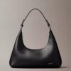 Perforated Emblem Logo Shoulder Bag Perforated Emblem Logo Shoulder Bag