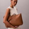 Perforated Emblem Logo Tote Bag Perforated Emblem Logo Tote Bag